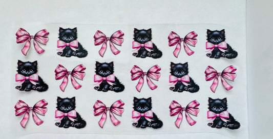 Black kitten and Bows