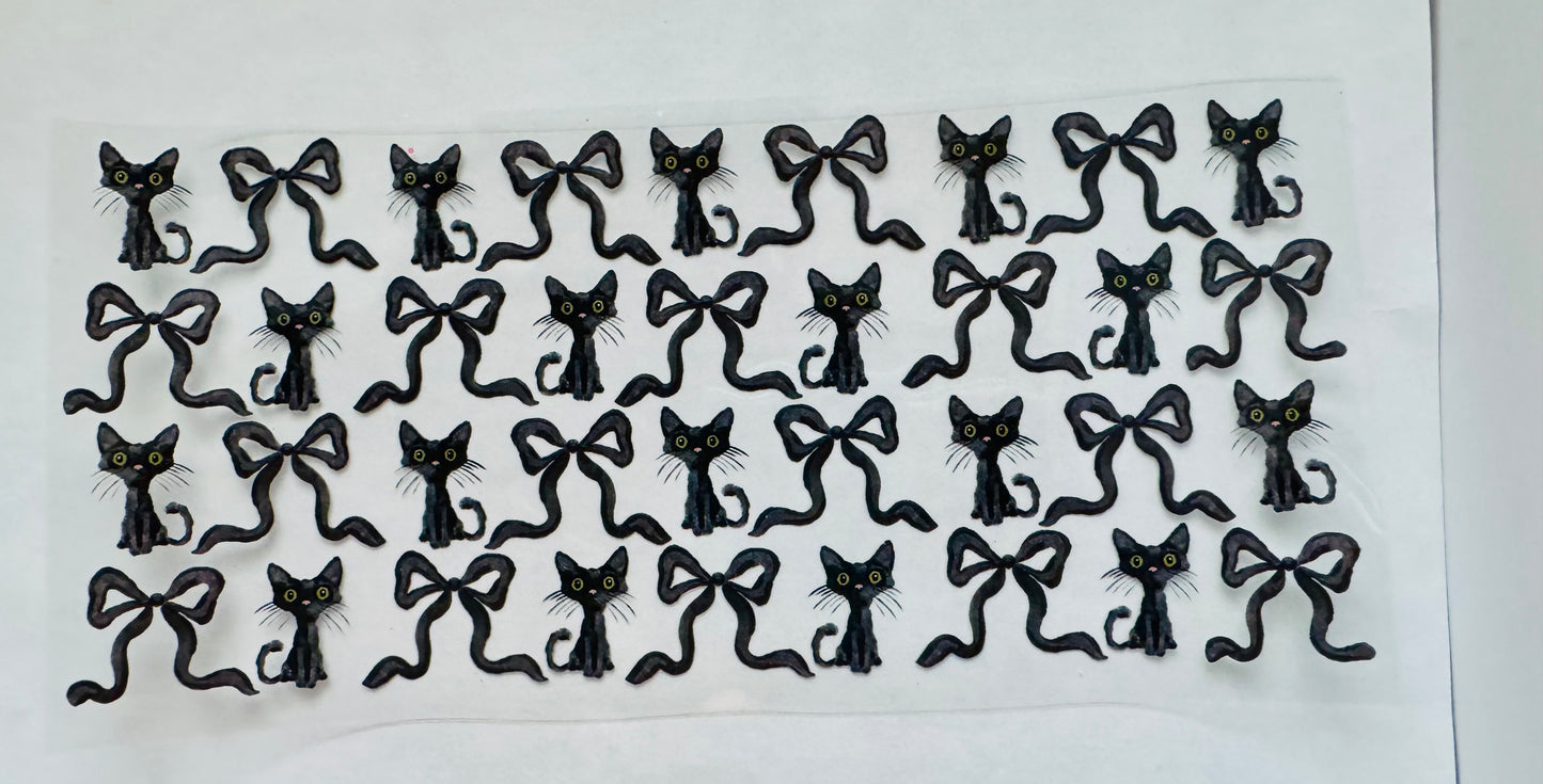 Black cat and bows